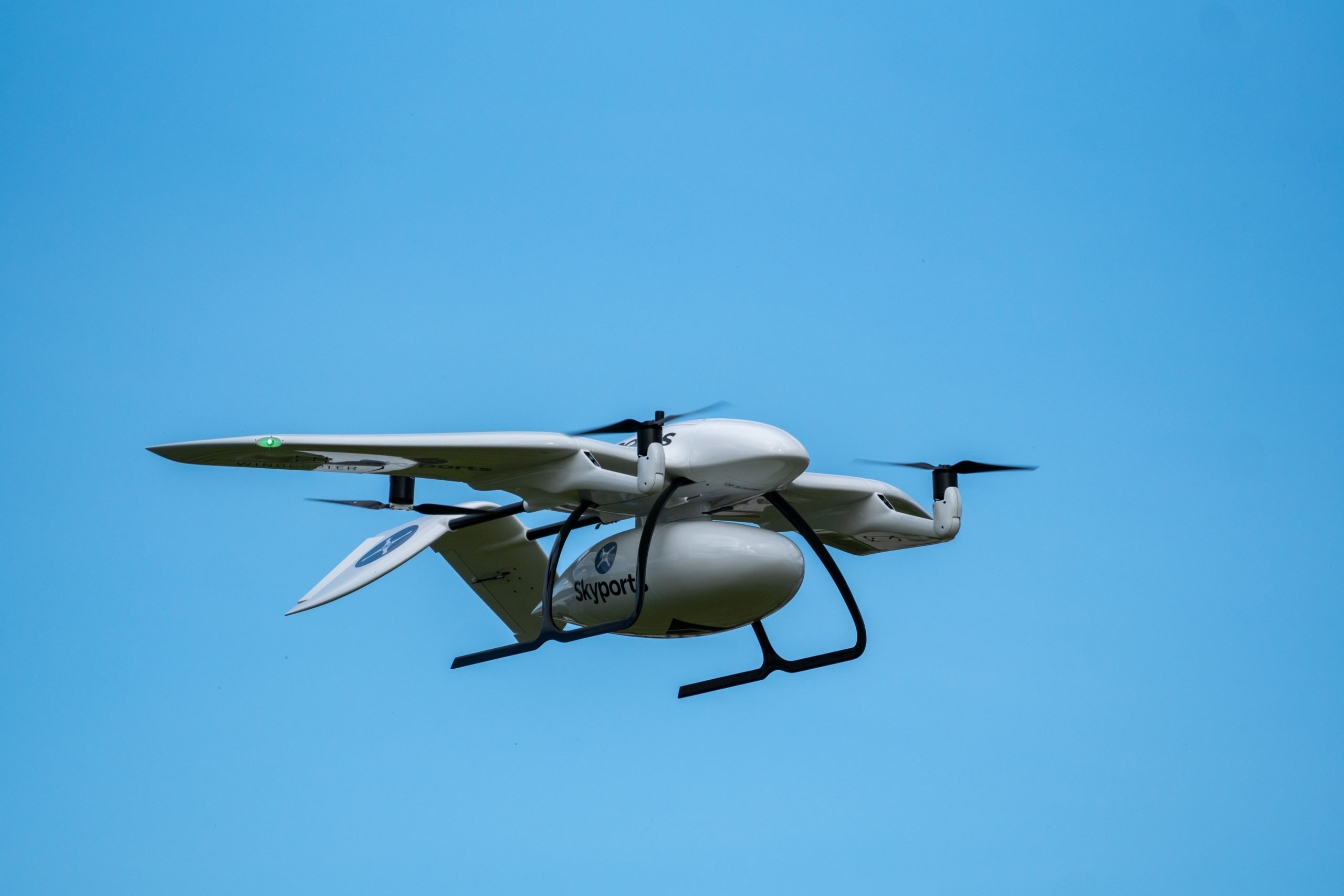 Skyports-delivery-drone-manufactured-by-Wingcopter-in-flight-front-Source-Skyports_ Skyports-delivery-drone-manufactured-by-Wingcopter-in-flight-front-Source-Skyports_